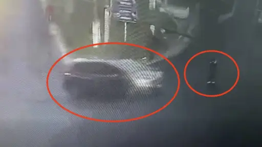 Automovilista atropella a agente de la PMT. ,Captura de pantalla video de Facebook.