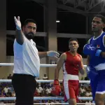 El boxeador nicaragüense Andy Javier Caballero fue descalificado durante su combate frente al dominicano Miguel Ángel Encarnación - Federación Dominicana de Boxeo